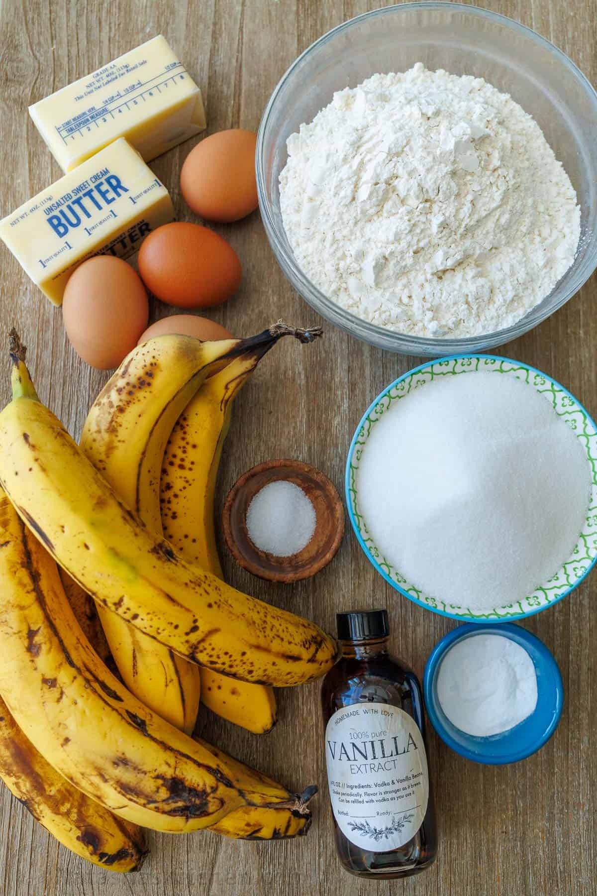 Ingredients for Banana Bundt Cake including bananas, eggs, butter, salt, baking soda, vanilla extract, flour and sugar