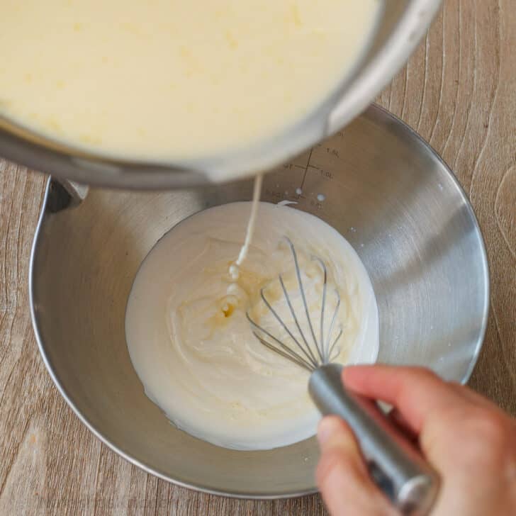 Add sour cream to a bowl with pouring lip and add the gelatin and cream mixture while whisking constantly.