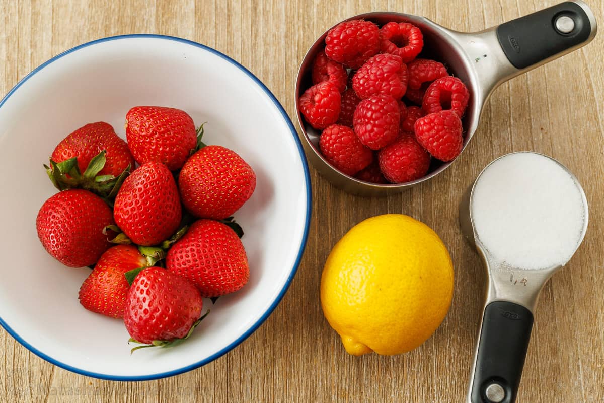 Ingredients for Berry Sauce: Fresh strawberries and raspberries, lemon juice, sugar