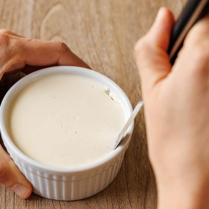 Run a knife between the ramekin and cooled and set Panna Cotta to release it from the mold.