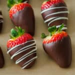 easy chocolate covered strawberries arranged on parchment paper