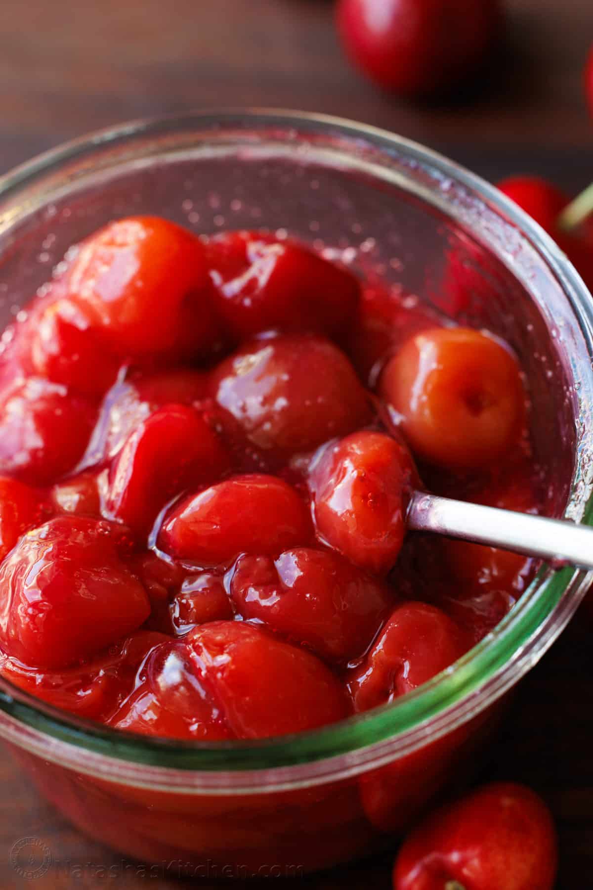 homemade cherry topping in a glass bowl